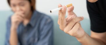 girl having problem with the smell of cigarettes