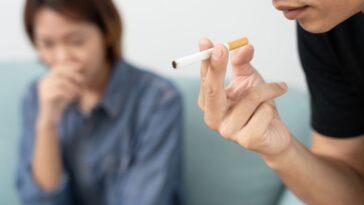 girl having problem with the smell of cigarettes