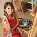 Girl pursuing her hobby as a professional painter